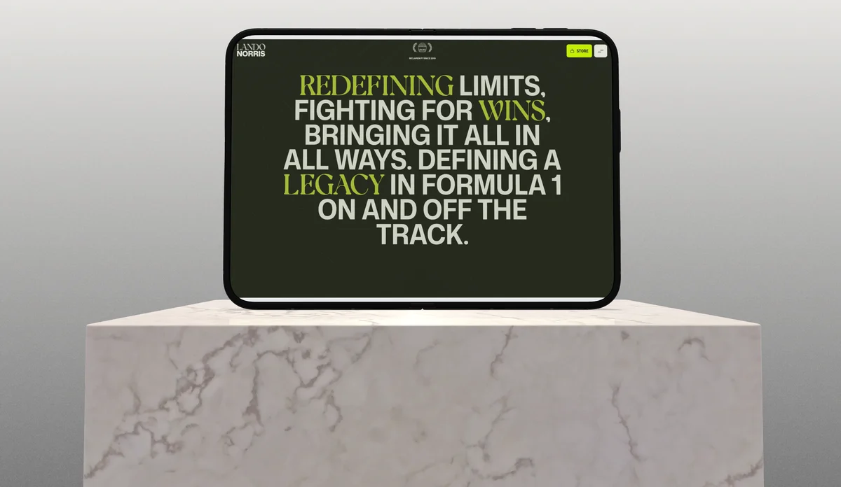 A folding phone standing on a white marble plinth, green and white headlines on its screen.