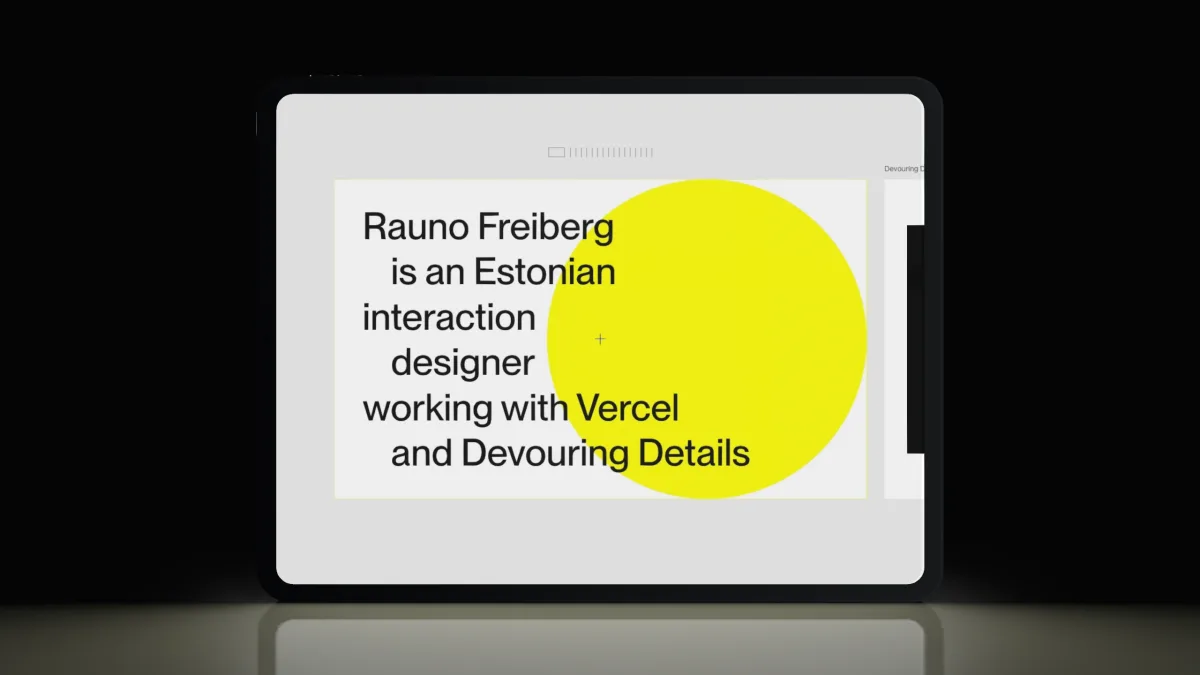 A tablet in darkness showing a page of black type over a yellow circle, reflected in the floor.