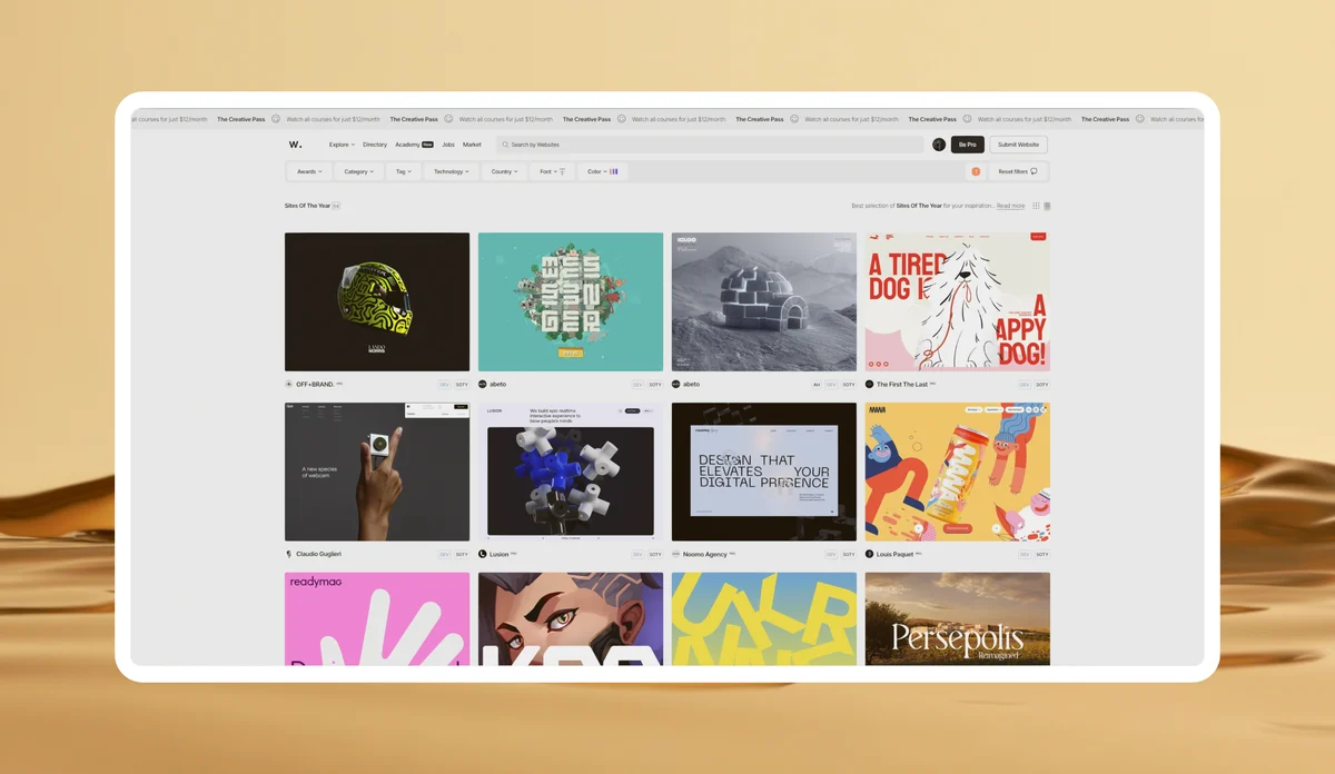 A browser window of colourful thumbnails floating over a photograph of desert dunes.
